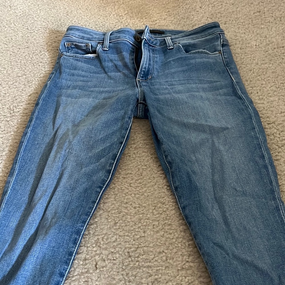 Light color mid rise skinny jeans